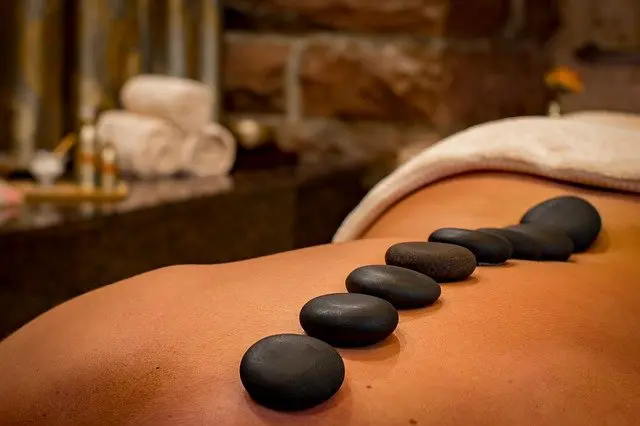 The Benefits of Hot Stone Massage for Back Pain and Sciatica